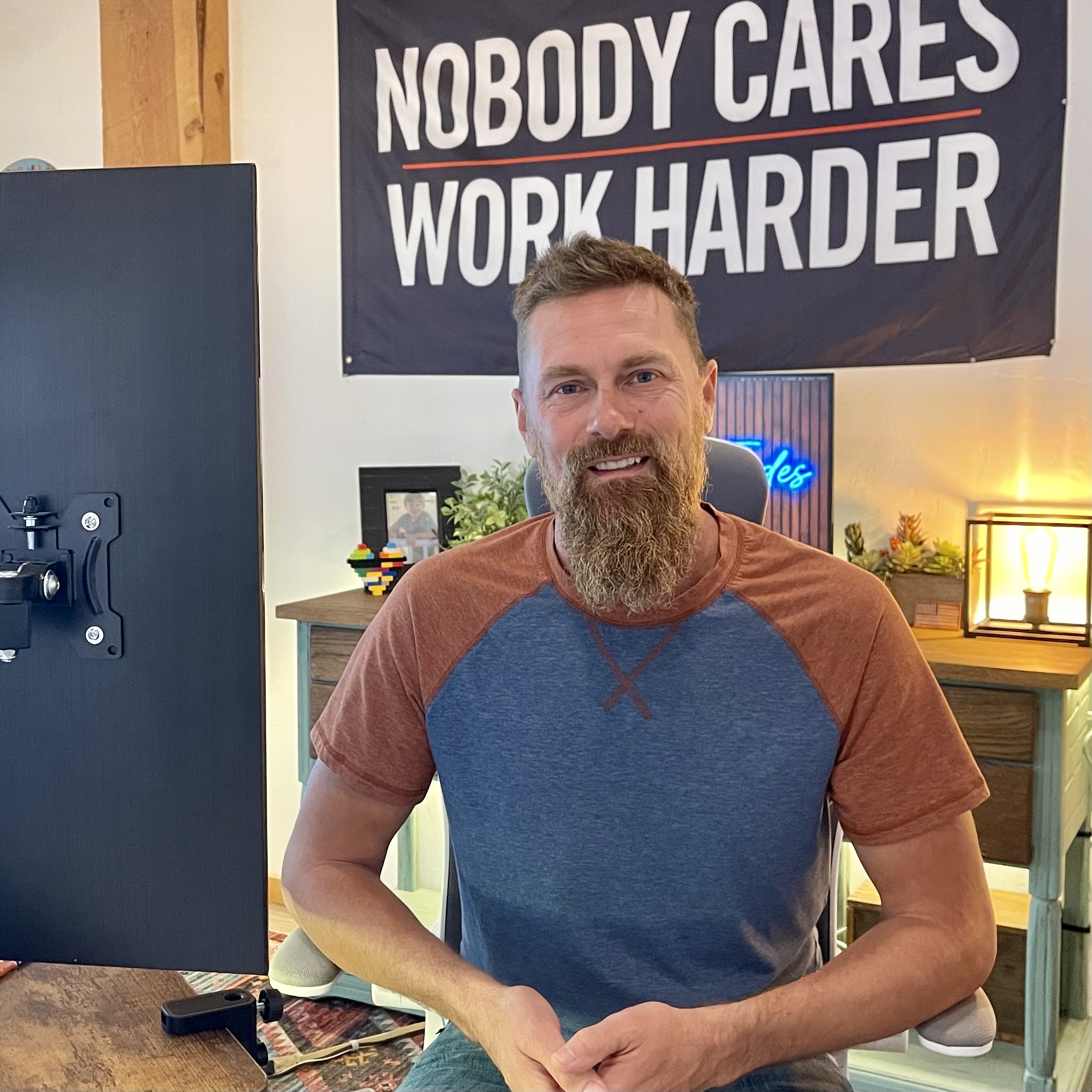 Bret James seated in his office